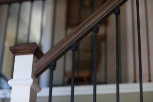 new newel post, railing, and iron spindles