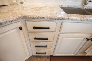 custom cabinetry with bronze pulls