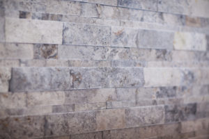 stacked stone accent wall in Master bath addtion