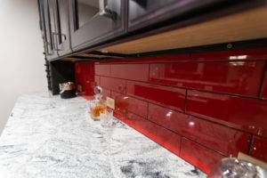 red subway tile backspash